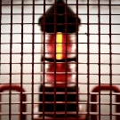 Lampe hinter Gittern